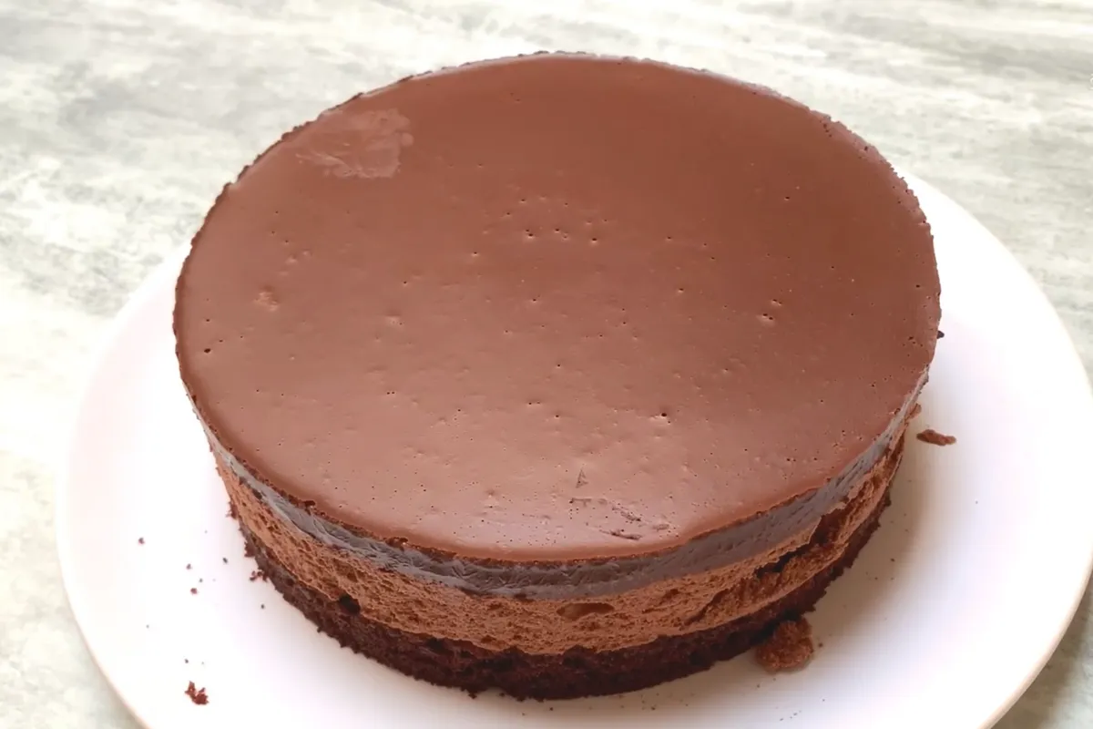Assembling the chocolate mousse  Cake 