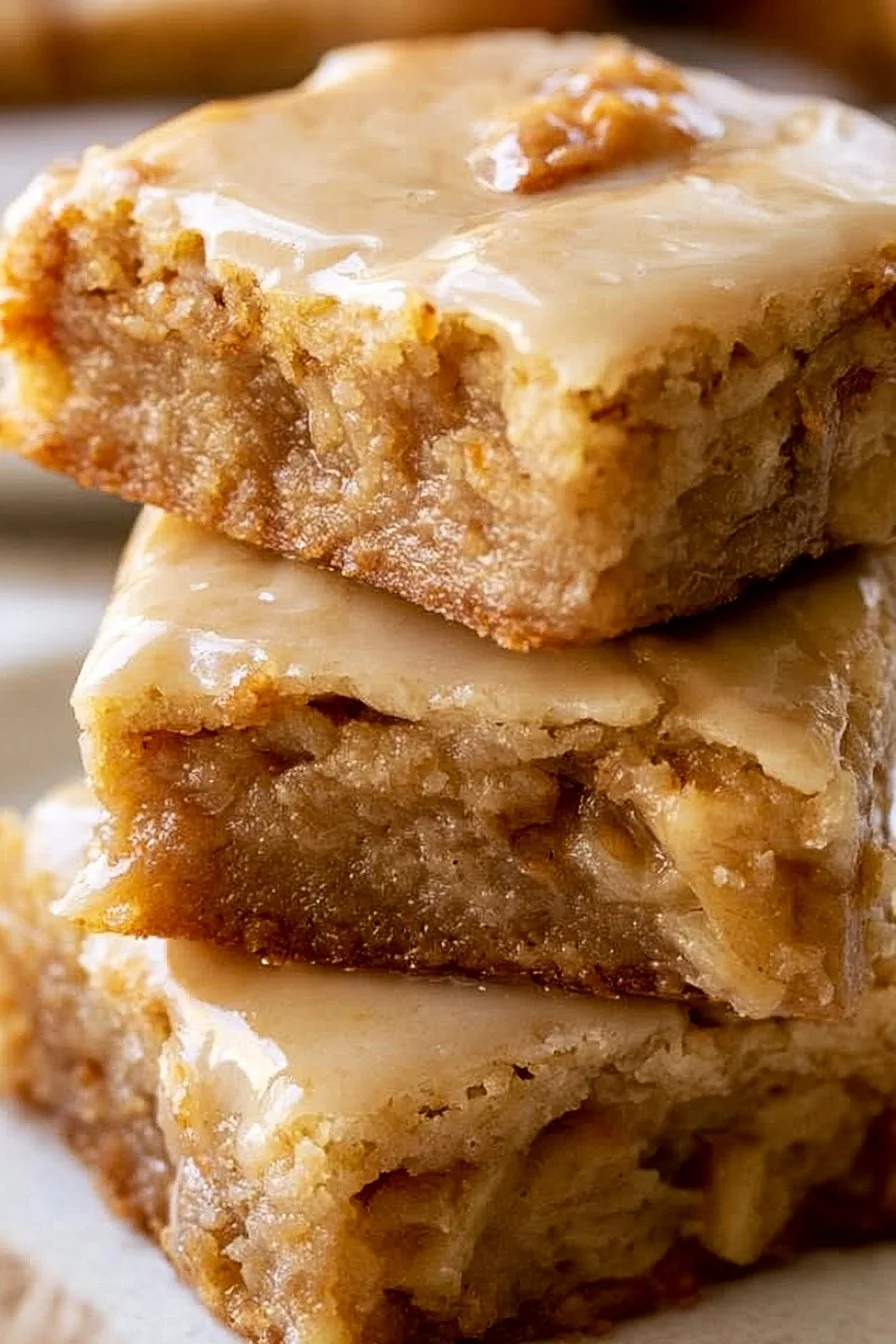 These chewy Maple Glazed Apple Blondies taste like sweet apple pie with a warm maple icing! This ho